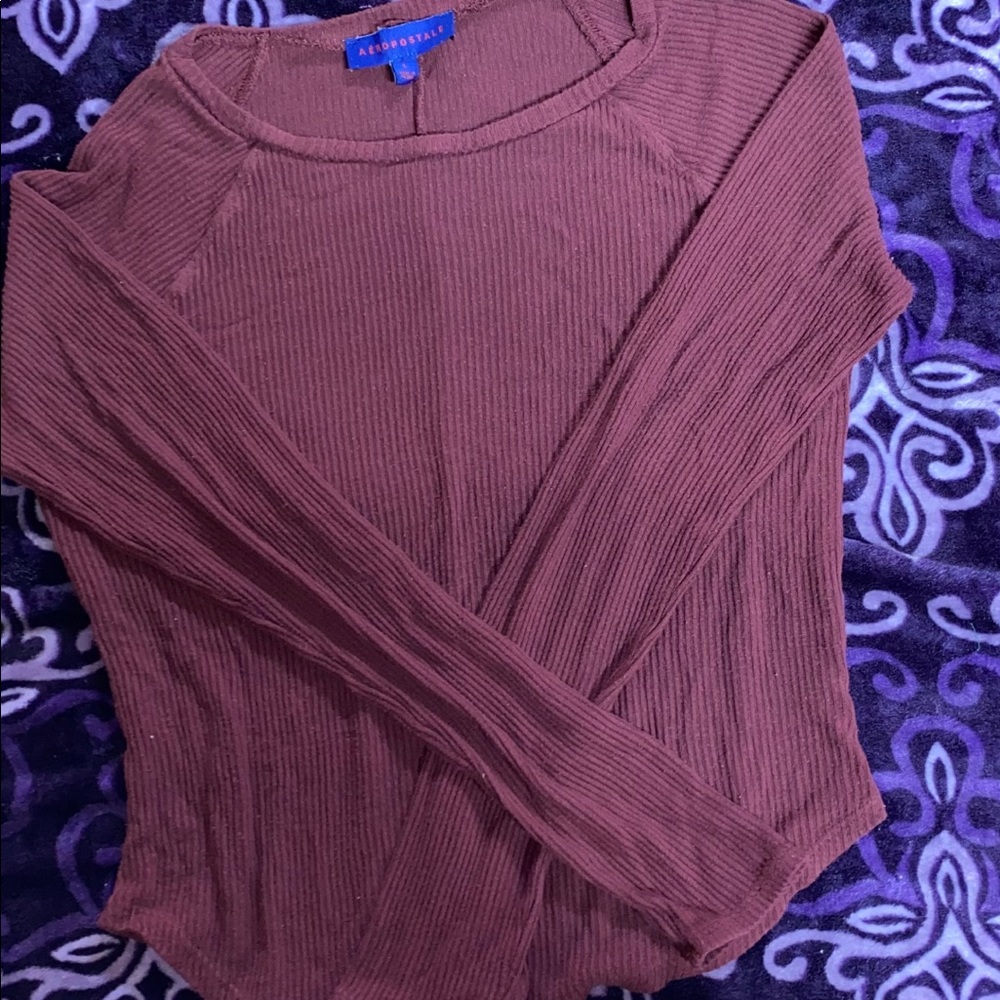 Maroon long sleeve shirt.